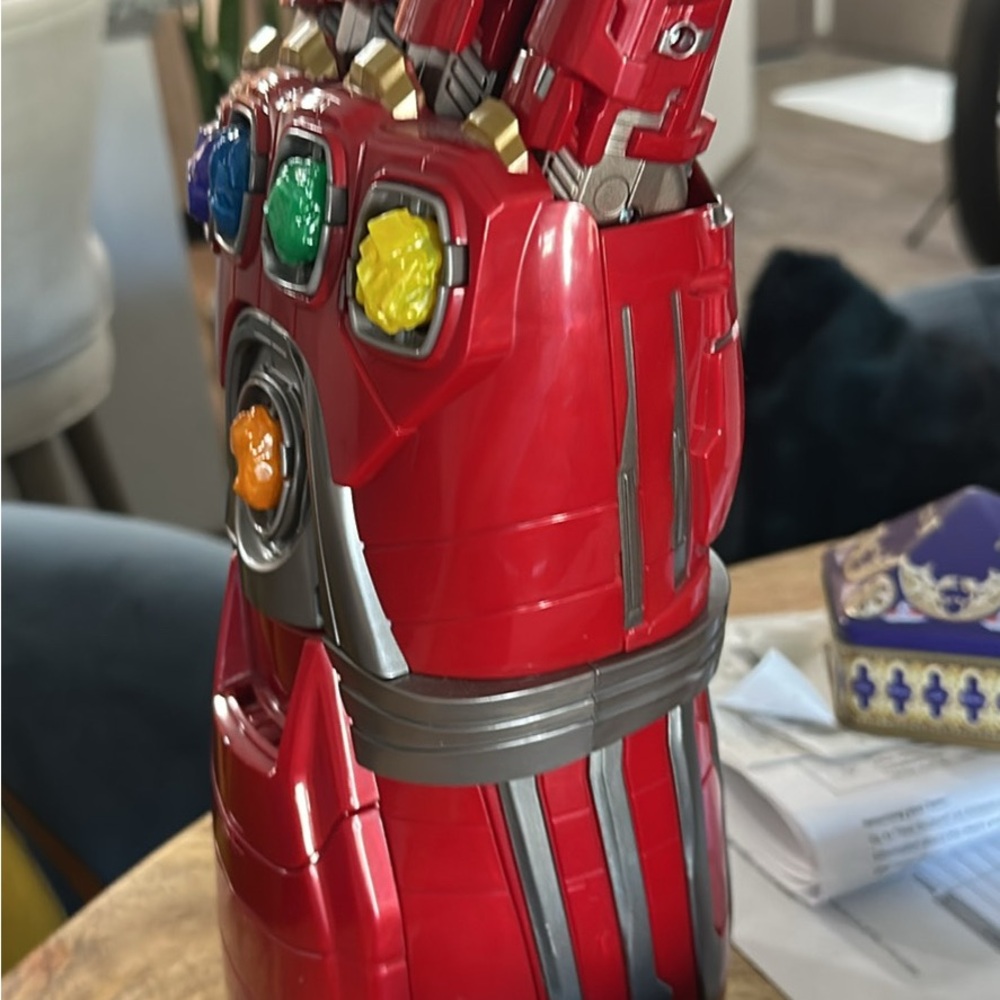 Like New displayed only. Nano Gauntlet Red from Disney missing 1 infinity stone.